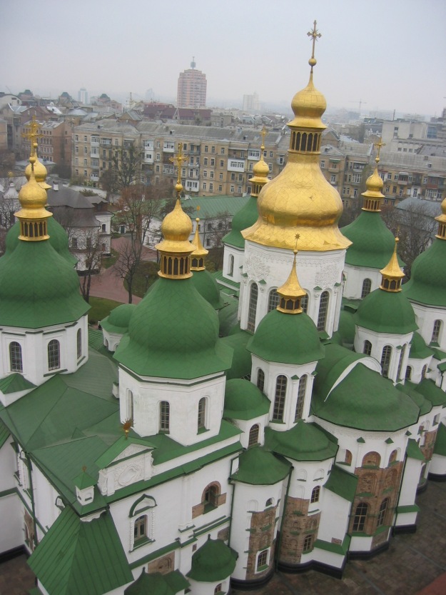 More golden cupolas against the otherwise grey city of Kiev.